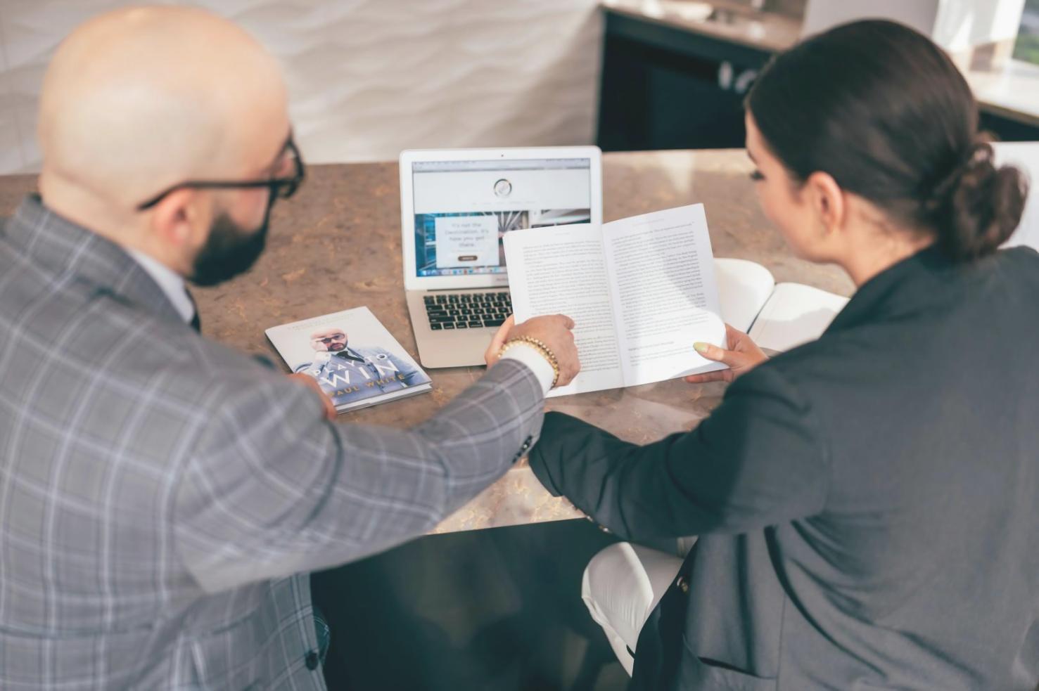 Interactive scenario modeling workshop session with participants analyzing financial frameworks